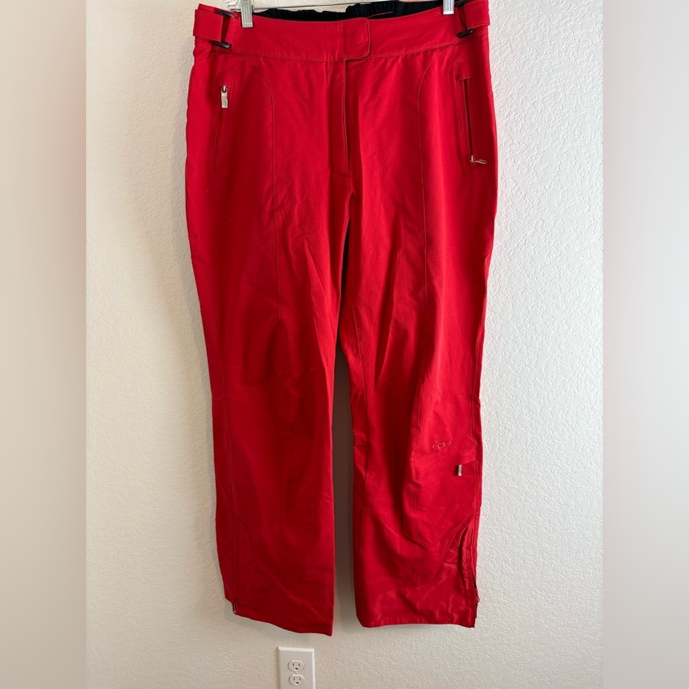 Marker: woman Vibrant Red ski pants